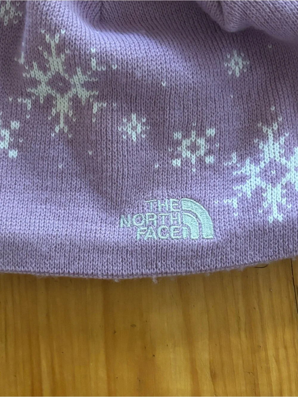 The North Face Purple Snowflake Fleece Lined Tassel Beanie Hat Girls